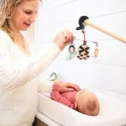 Wimmer kolotoč s klipom Stim to Go Manhattan Toy