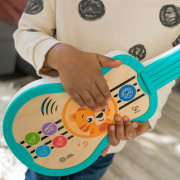 Hračka hudobná drevená ukulele Magic Touch Hape 6 m+ Baby Einstein