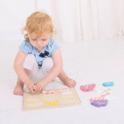 Bigjigs Baby Oblékací puzzle dievčatko