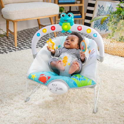 Lehátko hudobné vibračné so svetlami Kick to It Neptune do 9 kg Baby Einstein