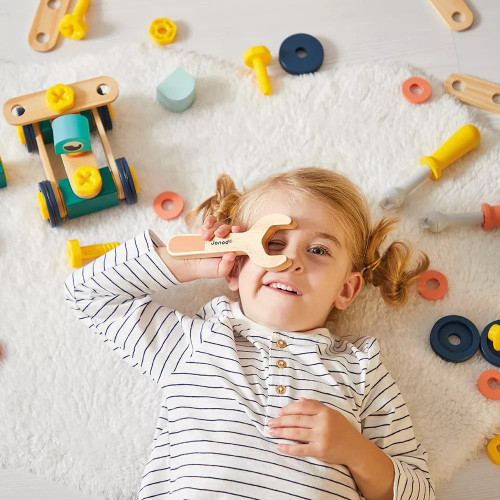 Drevená stavebnica s predlohami a náradím 100 ks Janod BricoKids