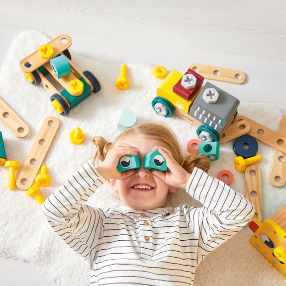 Drevená stavebnica s predlohami a náradím 100 ks Janod BricoKids