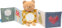 Medvedík plyšový s knižkou Snuggle Bear Taf Toys