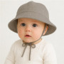 Dojčenský mušelínový klobúčik linen New Baby